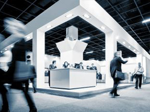 Blurred business people at a Exhibition Stand : Stockfoto oder Stockvideo und Fotos, Bilder, Stockmedien von rcfotostock | RC-Photo-Stock