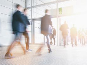 Blurred business people at a trade fair entrance : Stockfoto oder Stockvideo und Fotos, Bilder, Stockmedien von rcfotostock | RC-Photo-Stock