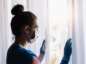 Bored woman in coronavirus  COVID-19 quarantine or under curfew looking out of window at a summer day : Stockfoto oder Stockvideo und Fotos, Bilder, Stockmedien von rcfotostock | RC-Photo-Stock