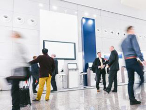 crowd of business people at a trade show booth : Stockfoto oder Stockvideo und Fotos, Bilder, Stockmedien von rcfotostock | RC-Photo-Stock