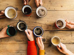 Friends group drinking coffee and cappuccino in a bar or restaurant - People hands cheering and toasting on top view point - breakfast together concept with white and black men and women : Stockfoto oder Stockvideo und Fotos, Bilder, Stockmedien von rcfotostock | RC-Photo-Stock