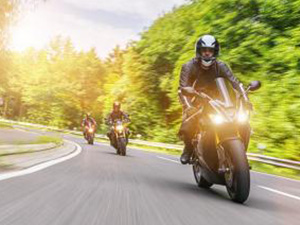 motorbiker on the forest road riding. having fun driving the empty road on a motorcycle tour journey. copyspace for your individual text. : Stockfoto oder Stockvideo und Fotos, Bilder, Stockmedien von rcfotostock | RC-Photo-Stock