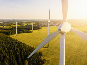 Wind turbines and agricultural fields on a summer day - Energy Production with clean and Renewable Energy - aerial shot, analog image style : Stockfoto oder Stockvideo und Fotos, Bilder, Stockmedien von rcfotostock | RC-Photo-Stock